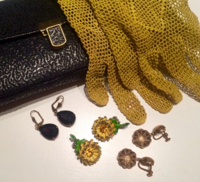 The sunflower earrings (my favorites), drop shaped earrings in dark purple, and those third ones were actually a birthday present; a pair of lace gloves and the clutch I had on my wedding day.
